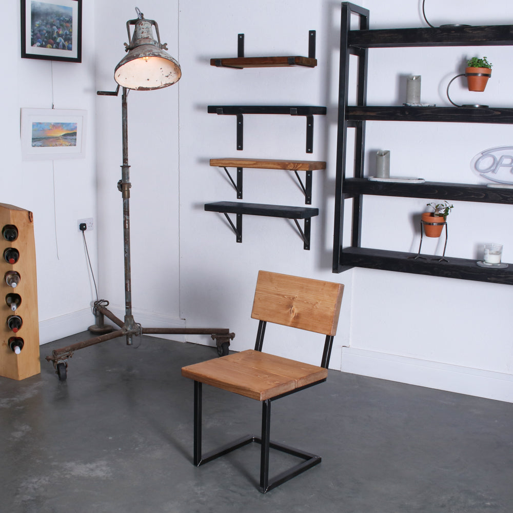 Crest and Weave solid oak garden chair with a chunky seat and angular cantilever frame