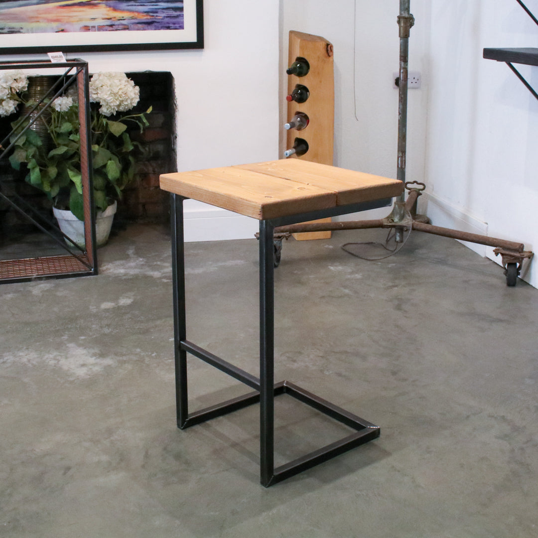 Crest and Weave solid oak 700mm bar stool with a chunky seat and cantilever steel frame