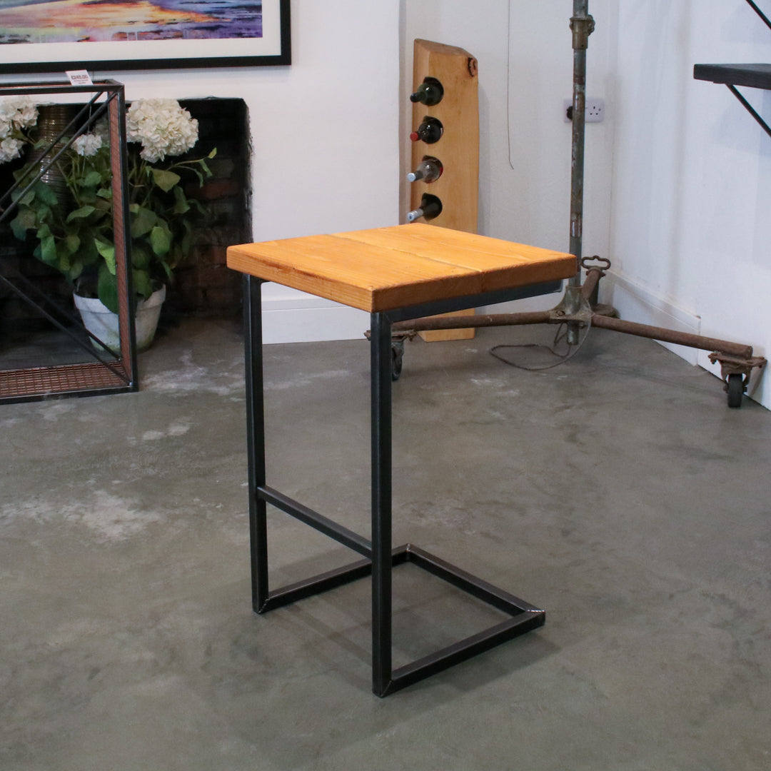 Crest and Weave solid oak 700mm bar stool with a chunky seat and cantilever steel frame