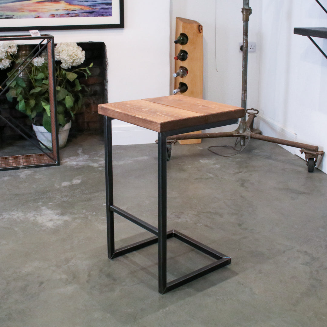 Crest and Weave solid oak 700mm bar stool with a chunky seat and cantilever steel frame