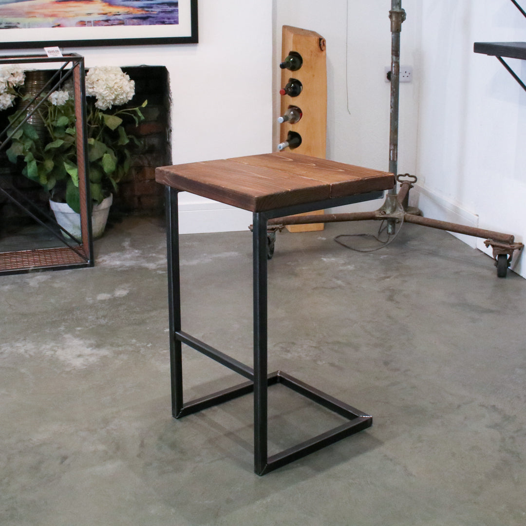Crest and Weave solid oak 700mm bar stool with a chunky seat and cantilever steel frame